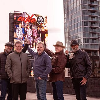 EXILE’S 60TH BAND ANNIVERSARY CELEBRATED IN IMPRESSIVE DISPLAY AT REGIONS BANK IN ROUNDABOUT PLAZA O